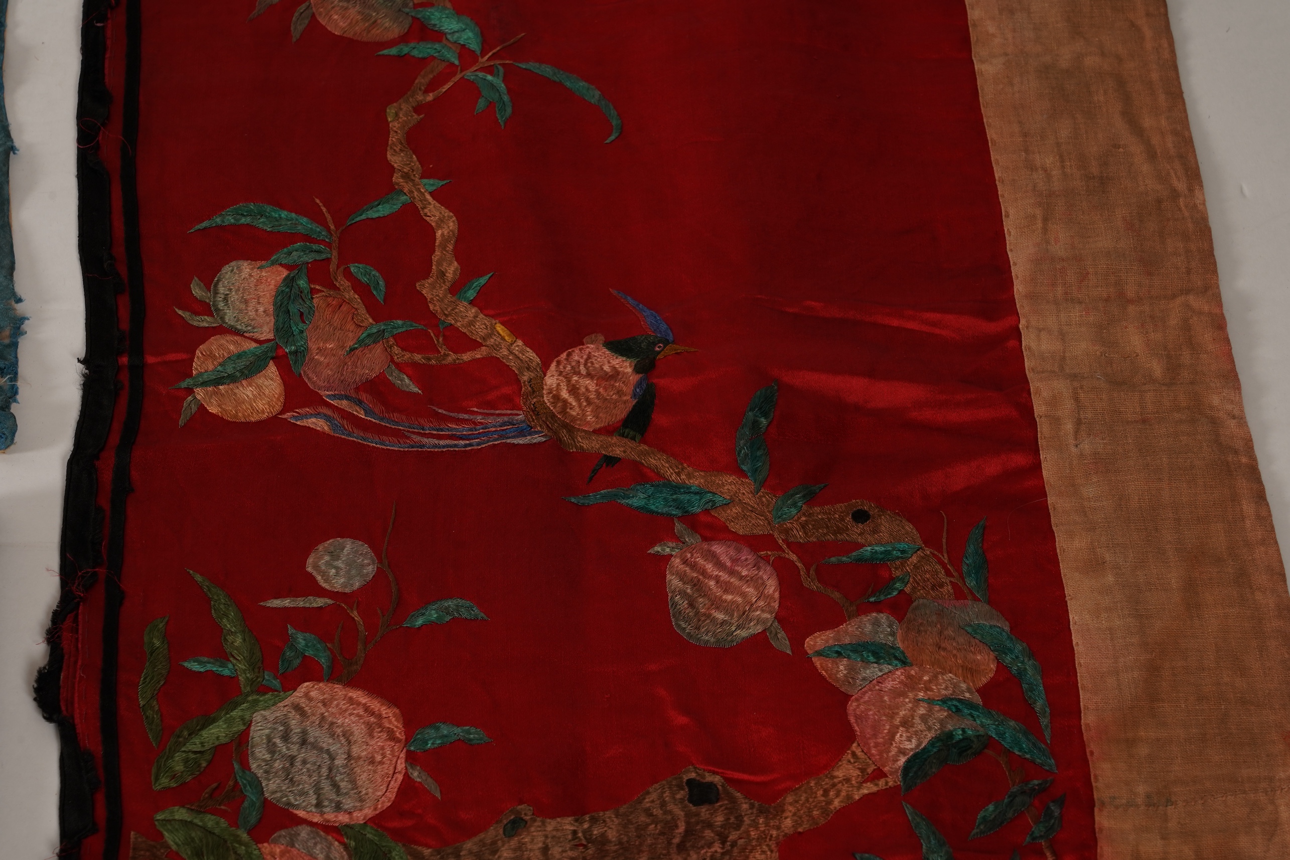 Four Chinese embroidered silk panels, late 19th/early 20th century and a similar Indian panel
